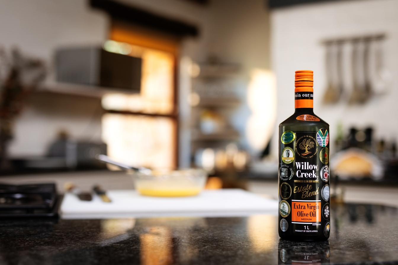 Willow Creek Estate Blend extra virgin olive oil on dark marble